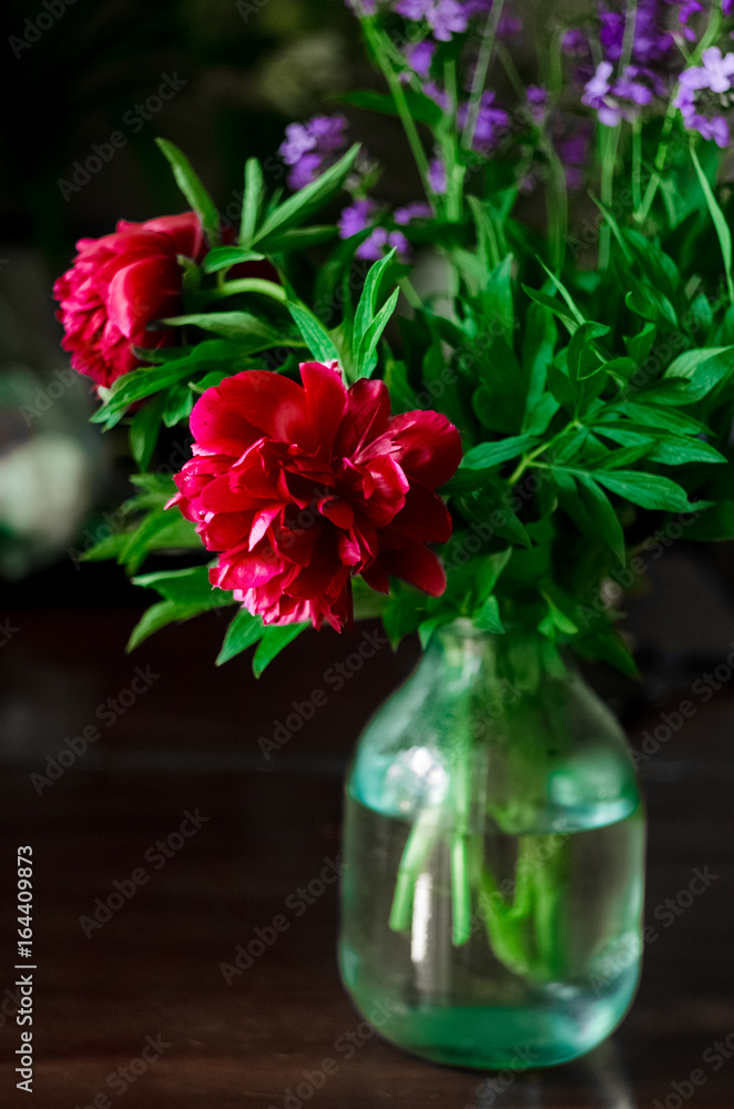 Fototapeta premium A bouquet for a gift. Bouquet of purple peony