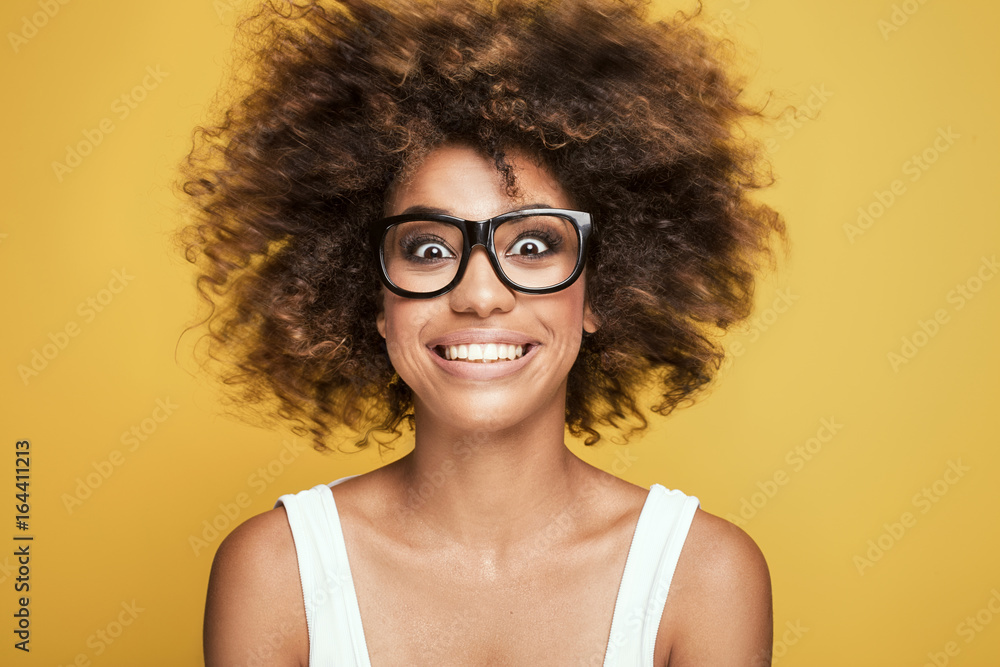 African american girl wearing eyeglasses,smiling. African american girl wearing eyeglasses,smiling.