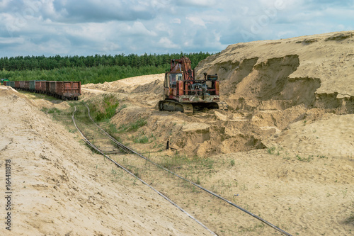 Sand quarry sand pit digger summer light 