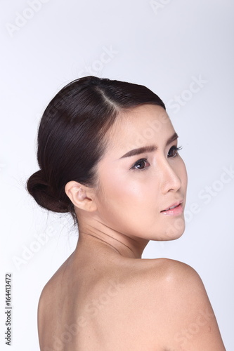 Asian Woman after make up hair style. no retouch, fresh face with nice and smooth skin