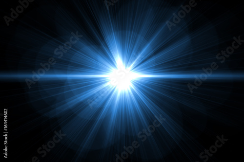 magic sunburst with glowing light . Colorful rays of light abstract background