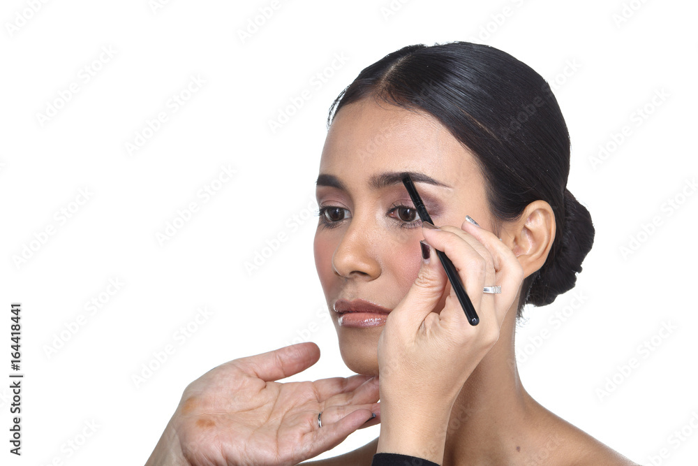 Asian Tan Skin Woman wtih Hand On applying cosmetic, Start from fresh face to finish process, studio lighting white background isolated copy space, Series pack photo Asian Tan Skin Woman wtih Hand On applying cosmetic, Start from fresh face to finish process, studio lighting white background isolated copy space, Series pack photo