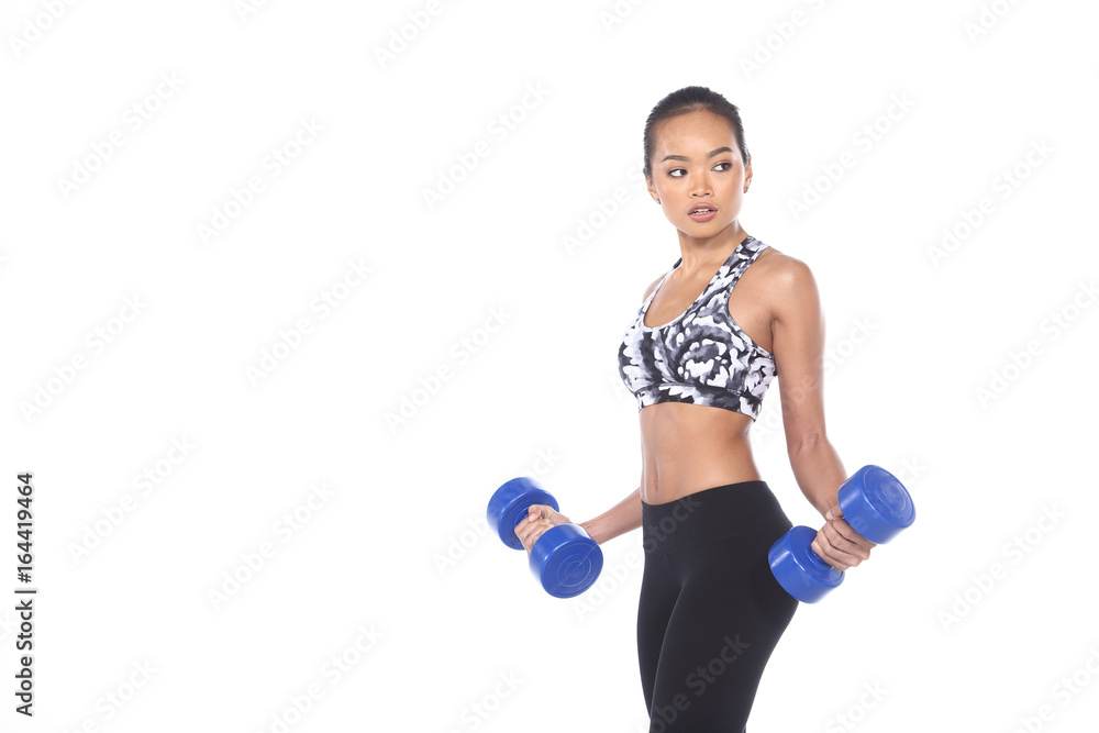 Tan Skin Asian Fitness Girl with blue dumbbell in Camouflage Sport Bra Tan Skin Asian Fitness Girl with blue dumbbell in Camouflage Sport Bra