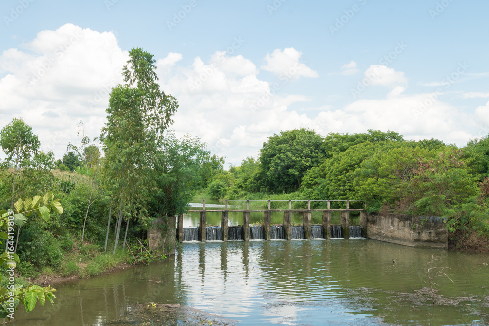 A water overflow concrete weir A water overflow concrete weir