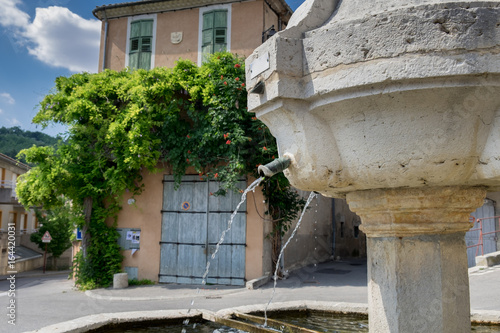 Ansient fountain in Riez. Alpes-de-Haute-Provence region,  France photo