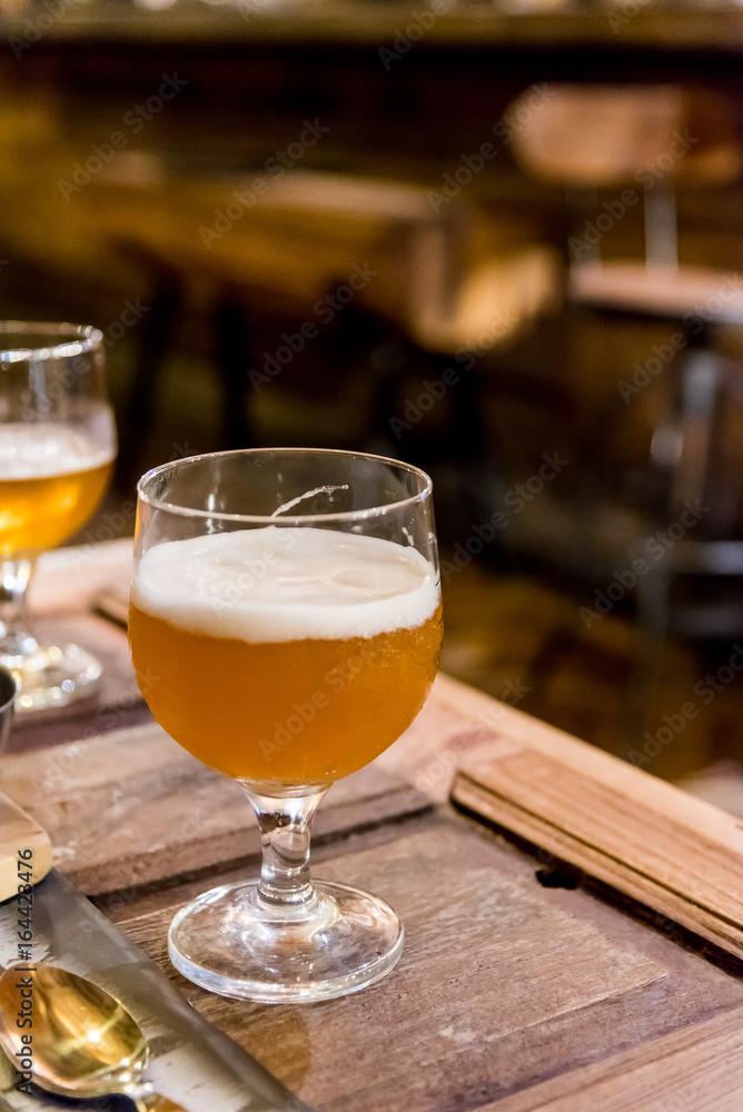 Drinking beer in the pub and restaurant cafe with blur bar background at night. Drinking beer in the pub and restaurant cafe with blur bar background at night.