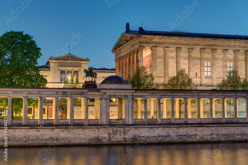Photography The Old National Gallery with the river Spree in Berlin at night