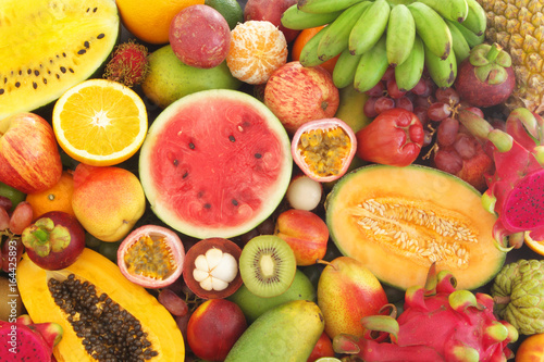 Many tropical fruits mixed together  fruit background