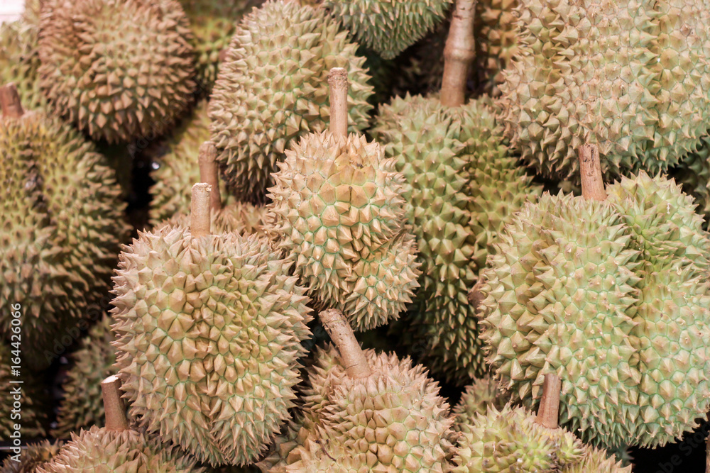 Durian fruits on shelf in the supermarket, king of Thailand fruits. Durian fruits on shelf in the supermarket, king of Thailand fruits.
