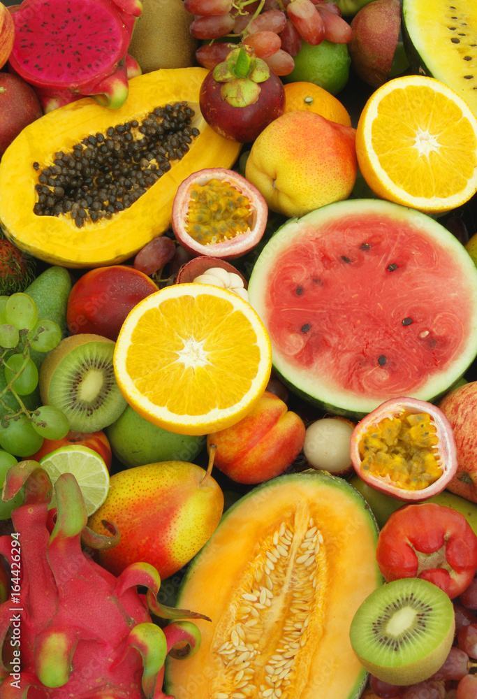 Many fresh fruits as food background Many fresh fruits as food background