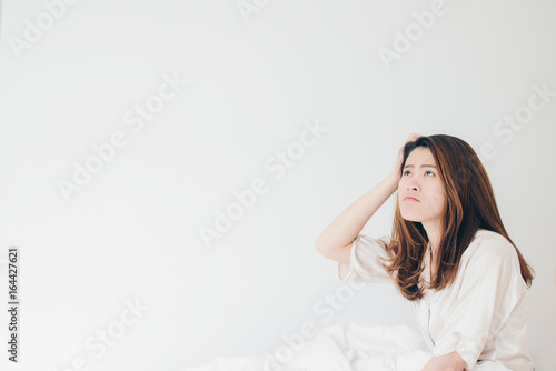 Portrait of asian women looking at white background.