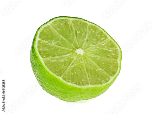 Half of lime citrus fruit isolated on white background