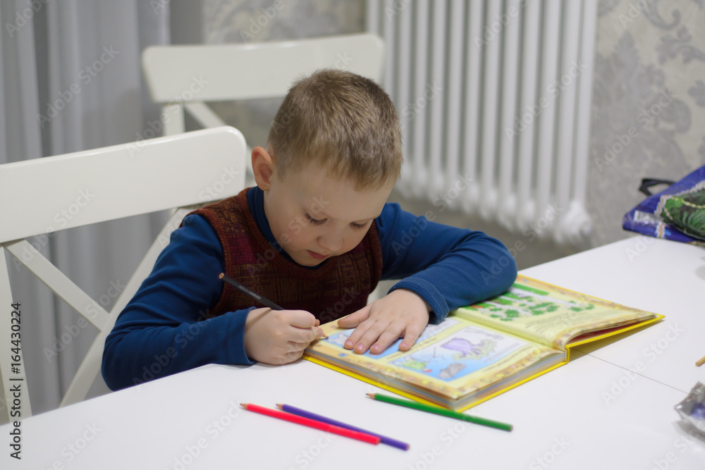 boy reading a book boy reading a book