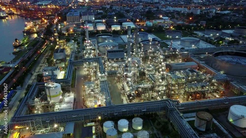 4K Night aerial Shot from oil tanks in a refinery
