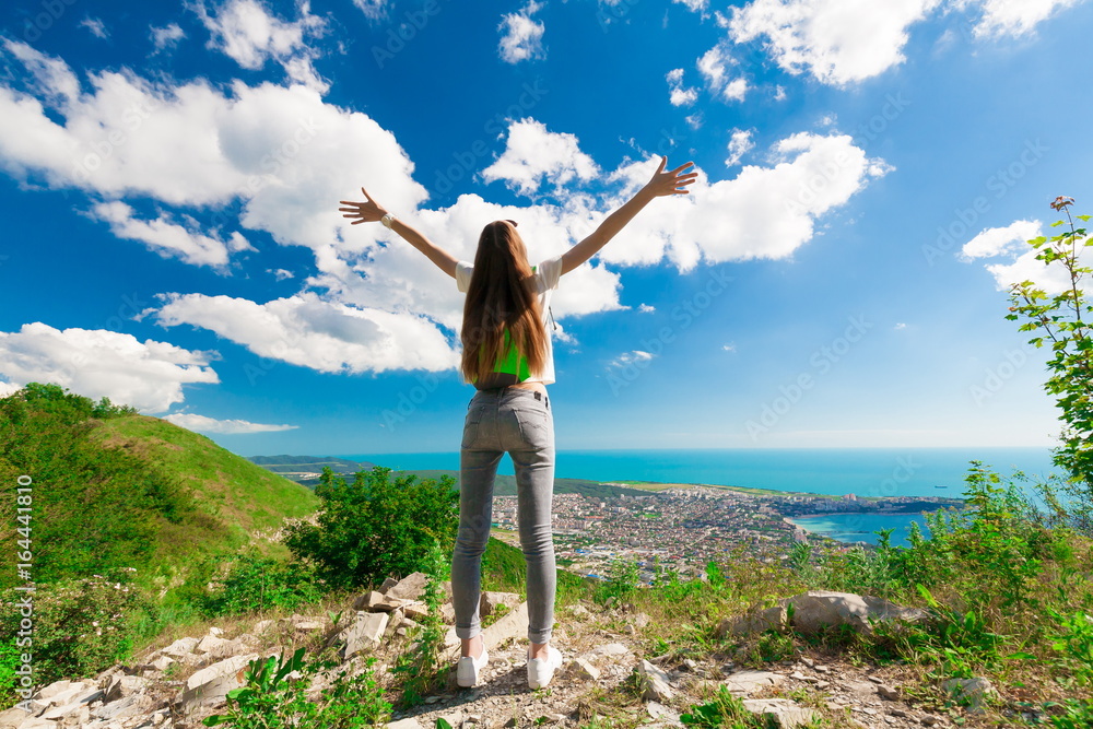 Mountain sea summer. Back. Jeans and shirt Mountain sea summer. Back. Jeans and shirt