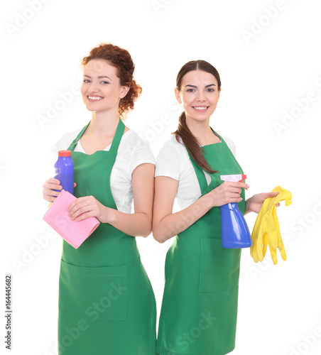 Cleaning staff in green apr...