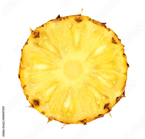Round pineapple slice isolated on white background