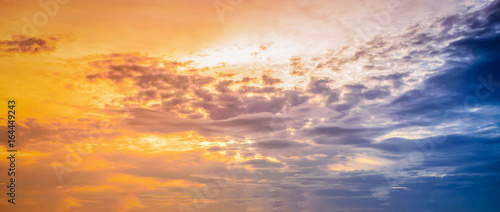 Sunset with dramatic sky background. © nuttawutnuy