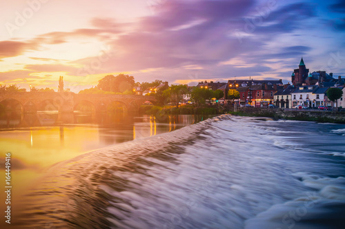 The River Nith and old bridge at sunset in Dumfries, Scotland, UK. photo