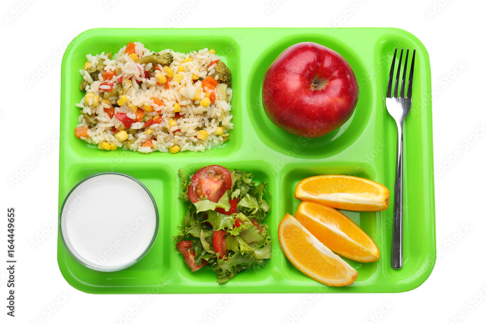 Serving tray with delicious food on white background. Concept of school lunch Serving tray with delicious food on white background. Concept of school lunch