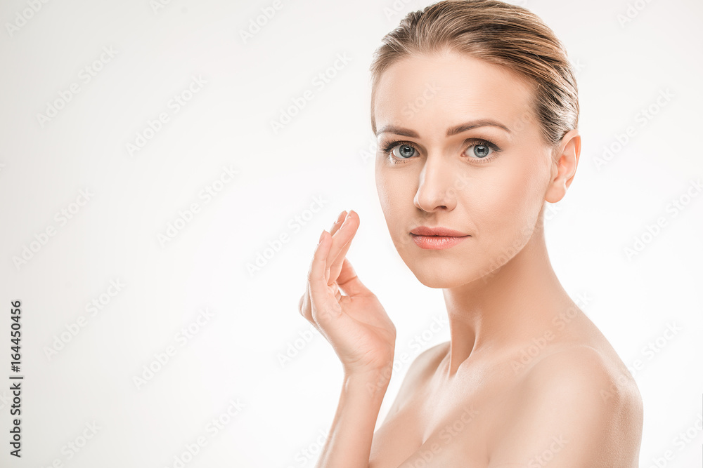 Mature woman beauty health care isolated on white Mature woman beauty health care isolated on white