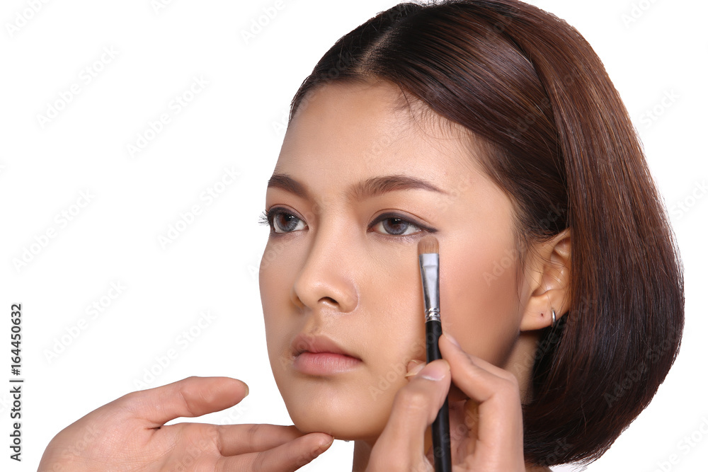 Cosmetic, Applying Make up, Beauty Process, white studio background, Perfect Healthy Skin, eye shadow brush and palette on eyes Cosmetic, Applying Make up, Beauty Process, white studio background, Perfect Healthy Skin, eye shadow brush and palette on eyes