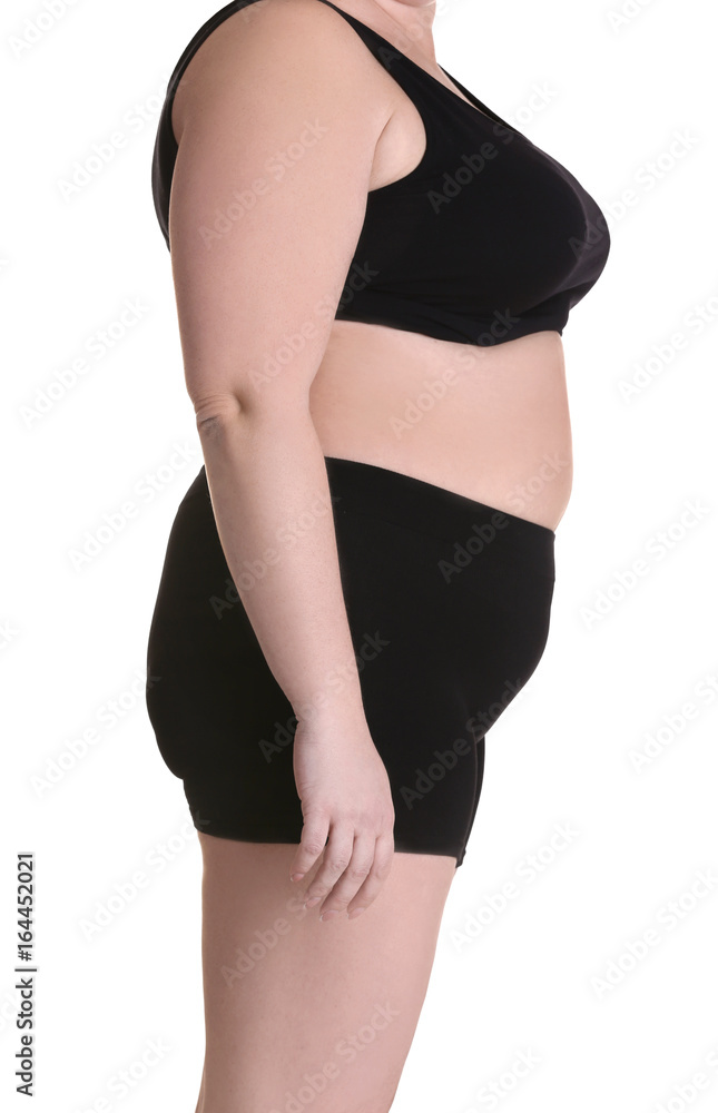 Fototapeta premium Stout adult woman on white background. Weight loss concept