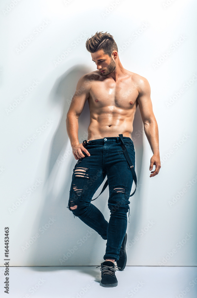 Fototapeta premium Full length portrait of a sexy muscular shirtless man
