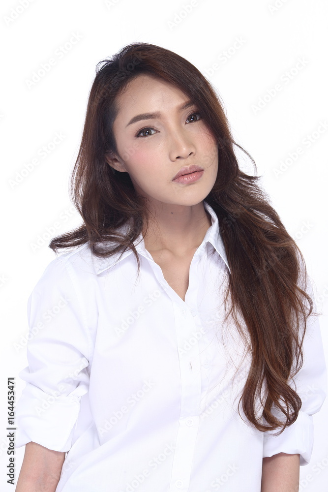 Perfect Healthy Female Model with Natural Beauty Clean Look Fashion Make Up style in White Shirt, long hair, White Background in Studio Lighting, the concept of health, smile Face Perfect Healthy Female Model with Natural Beauty Clean Look Fashion Make Up style in White Shirt, long hair, White Background in Studio Lighting, the concept of health, smile Face