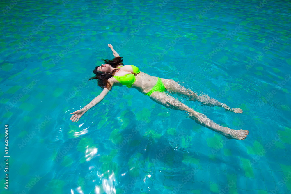 Thailand. Woman, bikini, pool
