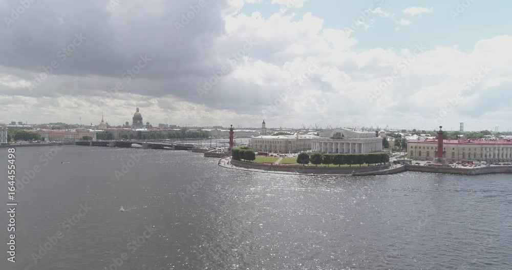 Aerial low altitude side fly over St. Petersburg neva with view of Stock Market Square and bridges in summer day Aerial low altitude side fly over St. Petersburg neva with view of Stock Market Square and bridges in summer day
