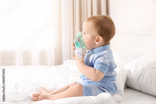 Cute little baby with nebul...