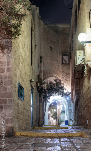 Queet street - Mazal Dagim at night in old city  Yafo, Israel. photo