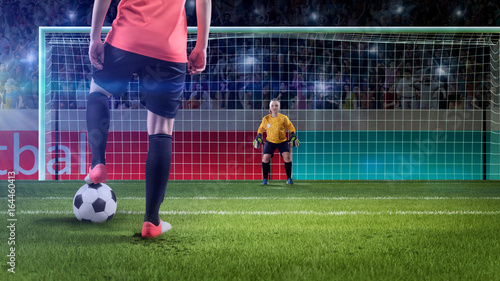 female soccer player prepairing to take penalty photo