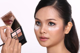 Cosmetic, Applying Make up, Beauty Process, white studio background, Perfect Healthy Skin, eye shadow box palette