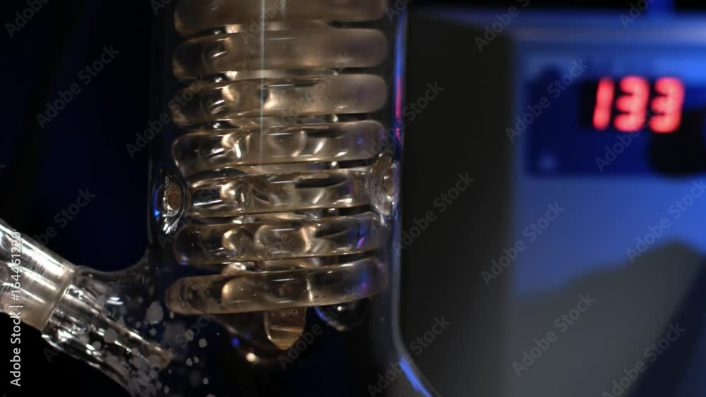 Crystal Spiral. Spiral glass tube with water close up. Glass spiral