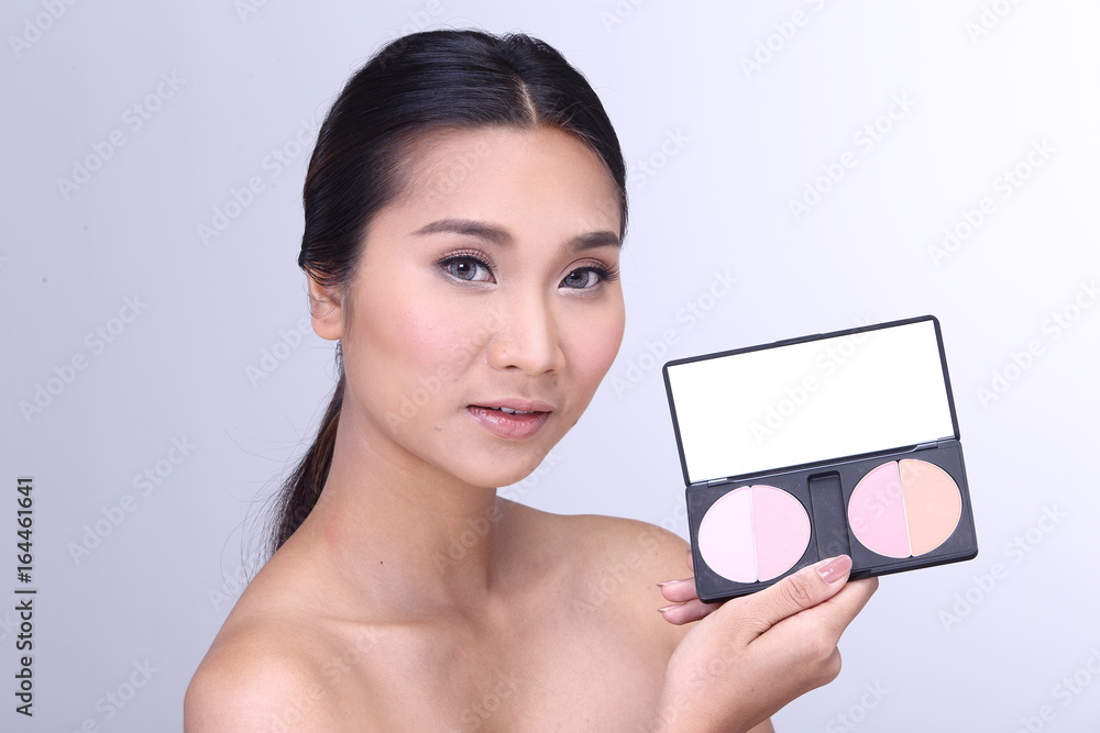 Cosmetic, Applying Make up, Beauty Process, white studio background, Perfect Healthy Skin, two round powder box palette with mirror Cosmetic, Applying Make up, Beauty Process, white studio background, Perfect Healthy Skin, two round powder box palette with mirror