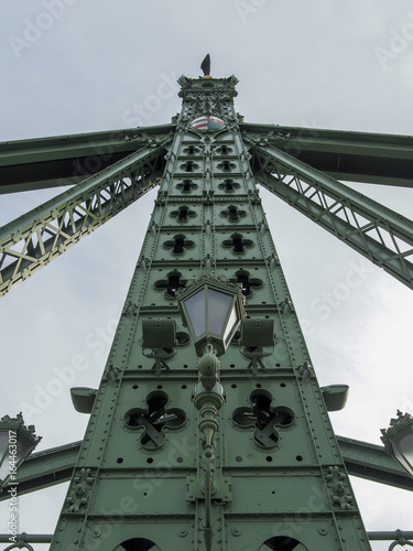 A closeup of a pillar on Liberty Bridge in Budapest photo