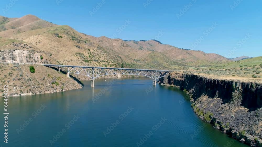 Support for a bridge with cars driving across it Support for a bridge with cars driving across it