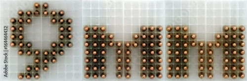 Fotografija 9mm round sign made set on an ammo tray