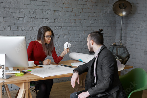 Tableau sur toile Angry female chief executive officer wearing glasses feeling mad while having in