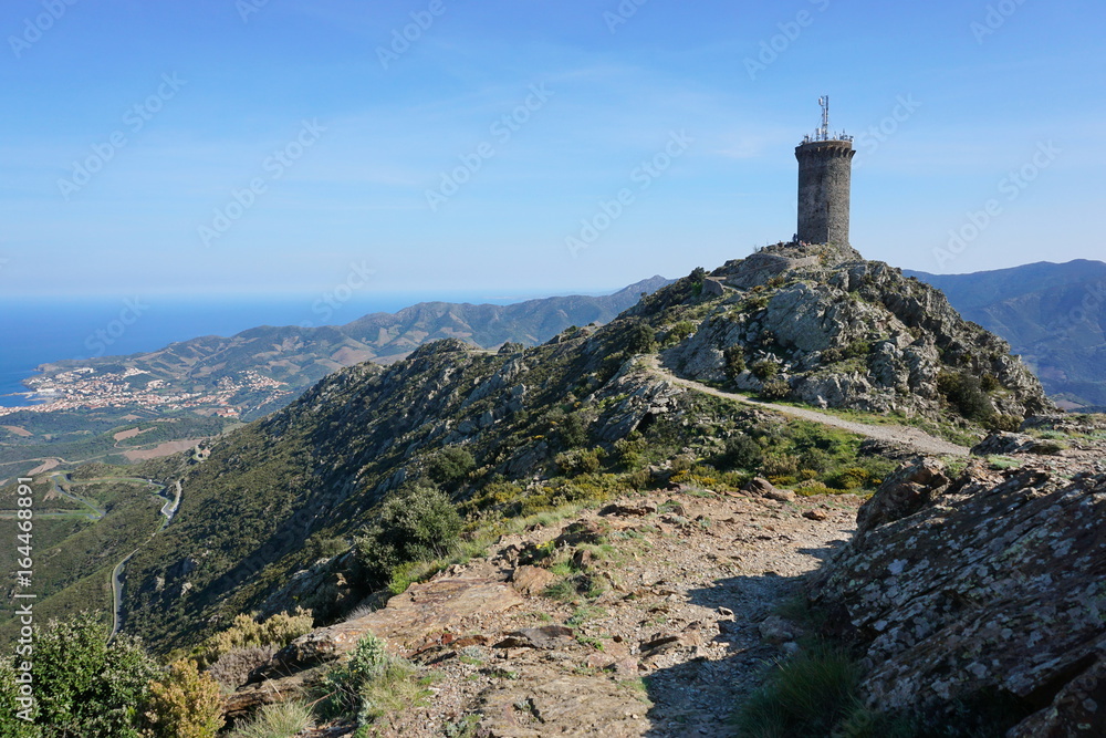 The Madeloc medieval watchtower, old stone tower overlooking the Vermilion coast, Mediterranean, Pyrenees Orientales, Roussillon, south of France The Madeloc medieval watchtower, old stone tower overlooking the Vermilion coast, Mediterranean, Pyrenees Orientales, Roussillon, south of France
