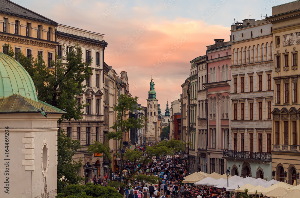 Fototapeta premium People goes by Grodzka street in Krakow