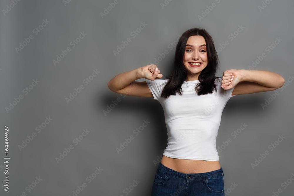 Happy girl posing to camera and shouting Happy girl posing to camera and shouting