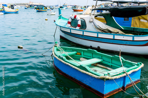 Traditional boats at Marsaxlokk Harbor in Malta © ilolab