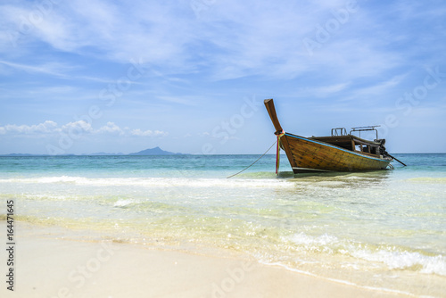Long tail boat on a tropical island, Thailand Andaman sea.