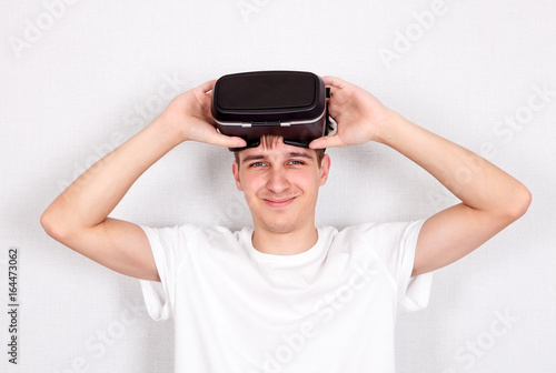 Young Man with VR Glasses