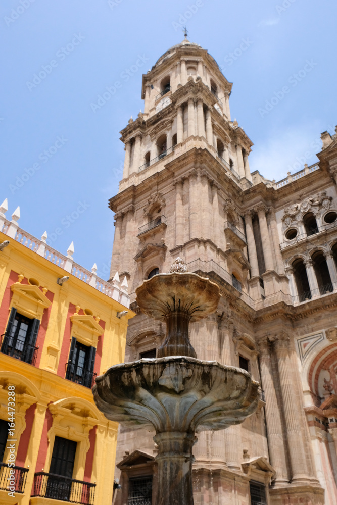MALAGA, ANDALUCIA/SPAIN - JULY 5 : Baroque Bishop's Palace designed by Antonio Ramos in the 18th Century in the Plaza de Obispo Malaga Costa del Sol Spain on July 5, 2017. Unidentified people