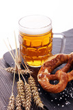 Beer in a mug. Oktoberfest salted soft pretzels and beer from Ge