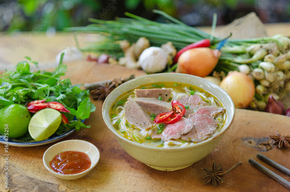 Vietnamese pho soup with beef, meatball, fresh vegetable Vietnamese pho soup with beef, meatball, fresh vegetable